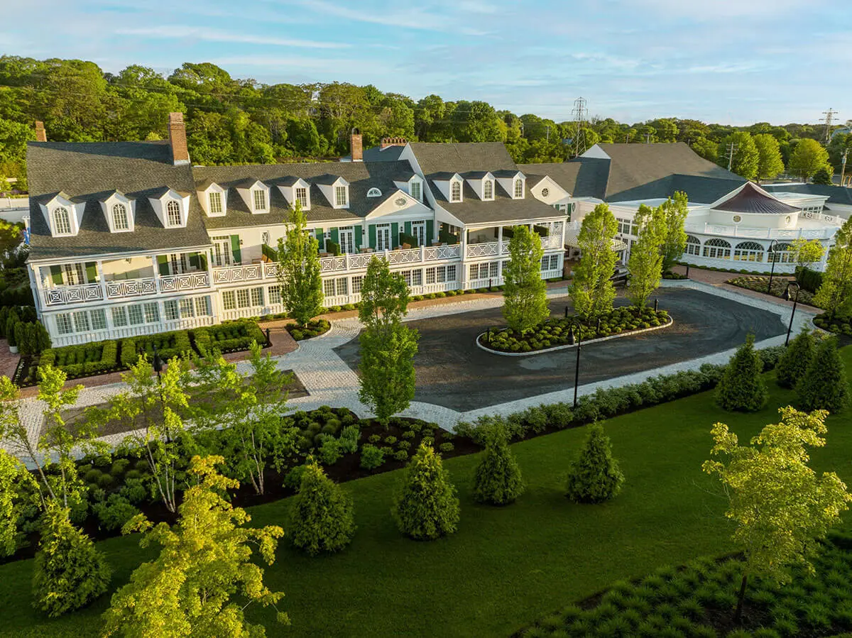 https://www.sperrytentshamptons.com/wp-content/uploads/2026/07/Canoe-Place-Inn.webp